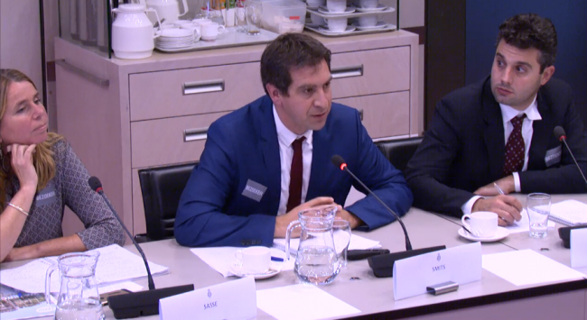 IRC's Stef Smits (centre) presents his case to Dutch Members of Parliament, flanked by Rolien Sasse (left) and Giacomo Galli (right). Screenshot livestream