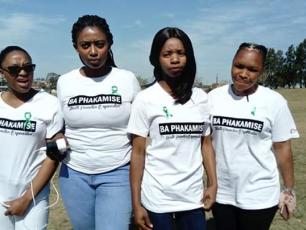 Girls wearing t-shirts of local NGO Ba Phakamise 