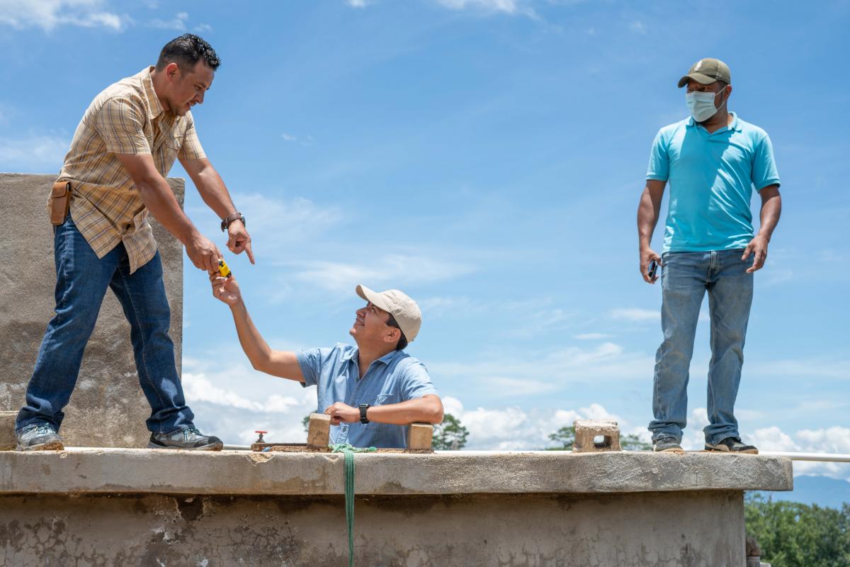 The men at a water treatment plant in Honduras