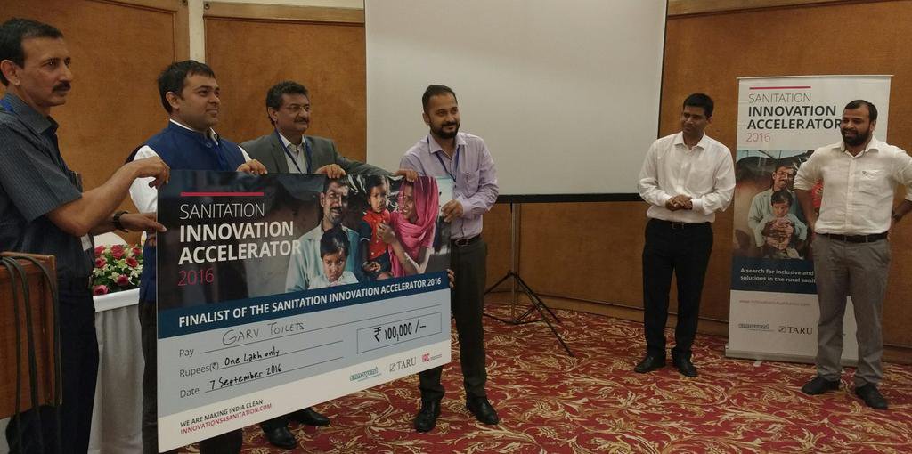 Mayank Midha (4th from left) receives Sanitation Innovation Accelerator award